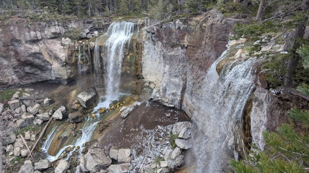Paulina Creek Falls drops 80 feet at the rim of Newberry Volcano's caldera — one of Central Oregon's most spectacular and most overlooked natural landmarks.